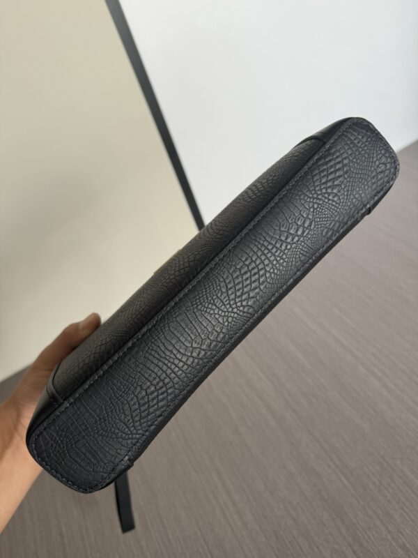 Top designer embossed leather clutch